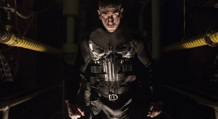 Picture of The Punisher in a dark room.