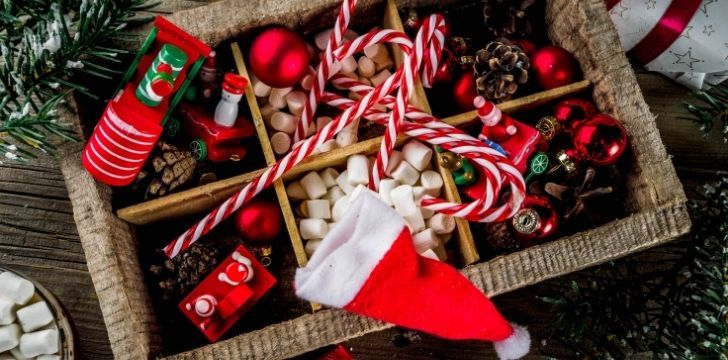 Traditional Christmas items like Christmas hat and candy canes and Christmas tree decorations