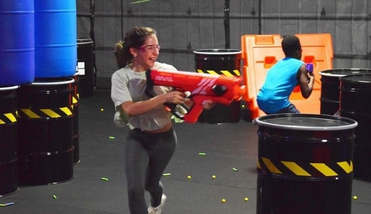 Children having a NERF gun fight