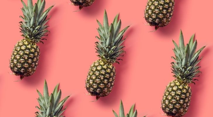 Pineapples with a pink background