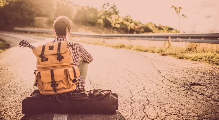 A backpacker waiting for a ride