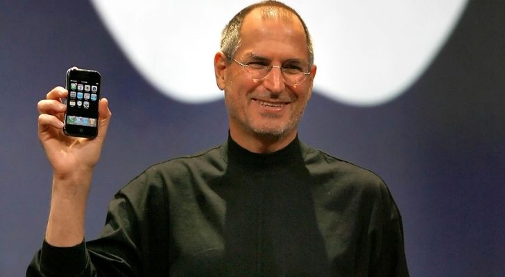 Steve Jobs presenting an iPhone