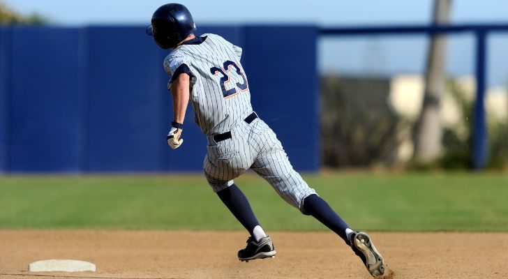 A baseball player running fast