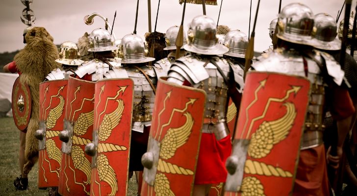 Roma soldiers in armor march together