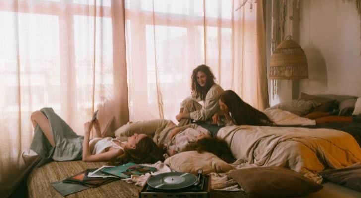 Four girls relaxing at a sleepover