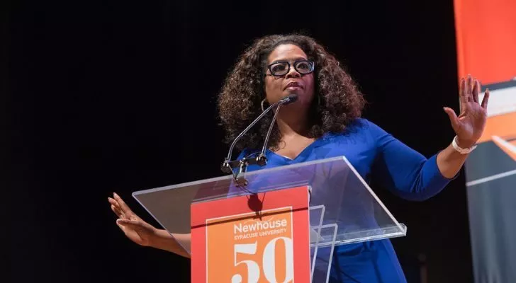 Oprah Winfrey giving a speech from a podium