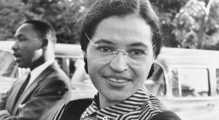 Rosa Parks with Martin Luther King Jr. in the background