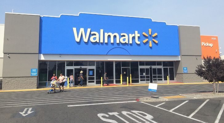 The front of a Walmart and some of its parking spaces