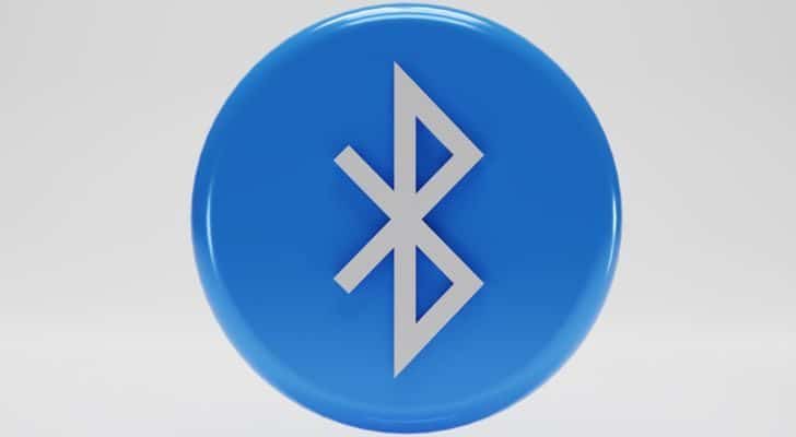 The Bluetooth logo on a blue circle