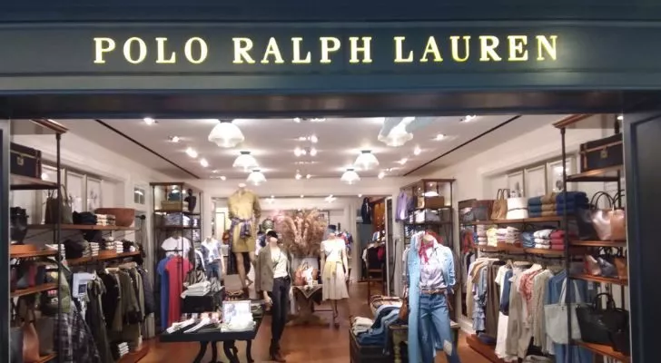 A fashion and clothing store with a large Polo Ralph Lauren sign above the entrance