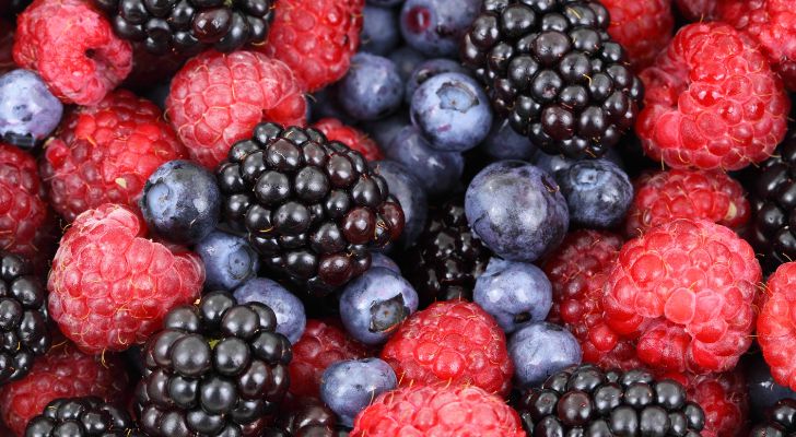 A collection of blueberries, rasberries, and blackberries.