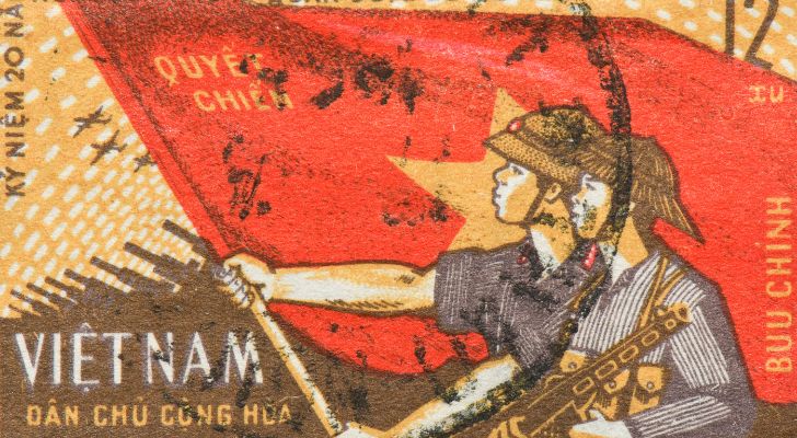 A postage stamp featuring symbols from the Vietnam War