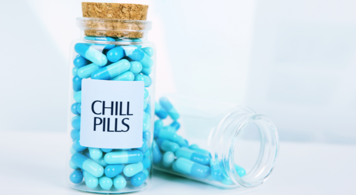 A bottle of bright blue pills with the label "Chill Pills"