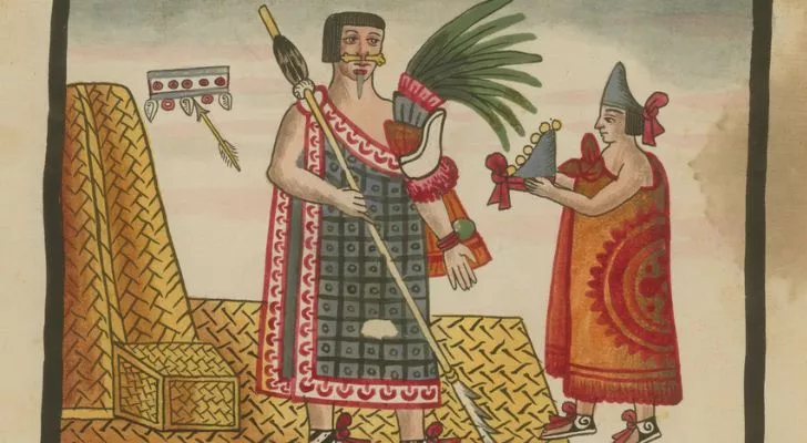 An Aztec being crowned king by an Aztec priest