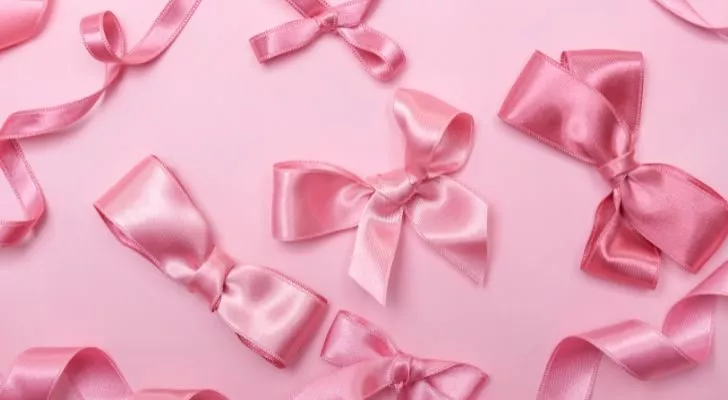 A collection of pink ribbons tied into various shapes