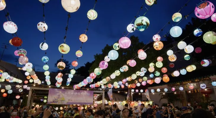 Lanterns hanging above a crowd in Hong Kong during the Mid-Autumn Festival