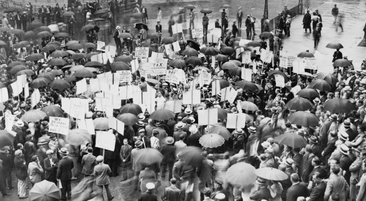 A crowd of people protesting during the Great Depression