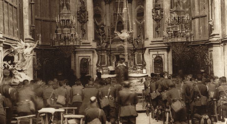 Canadian troops attend a Thanksgiving Mass in a bombed-out French cathedral in October 1918