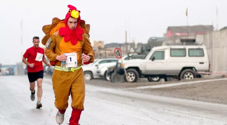 A man in turkey costume participating in a fun run