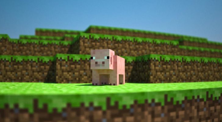 A pig on a hill in the popular computer game Minecraft