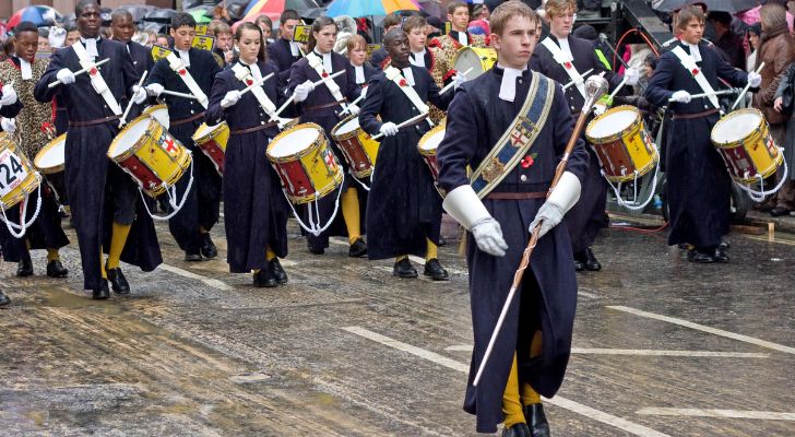 A marching band from Christ's Hospital School wearing their distinctive uniform