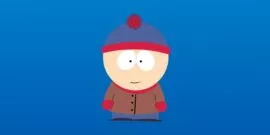 Stan Marsh from South Park wearing his iconic blue and red beanie, brown jacket, red mittens, and blue pants against a blue background.