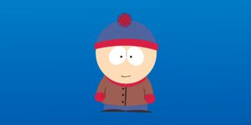 Stan Marsh from South Park wearing his iconic blue and red beanie, brown jacket, red mittens, and blue pants against a blue background.