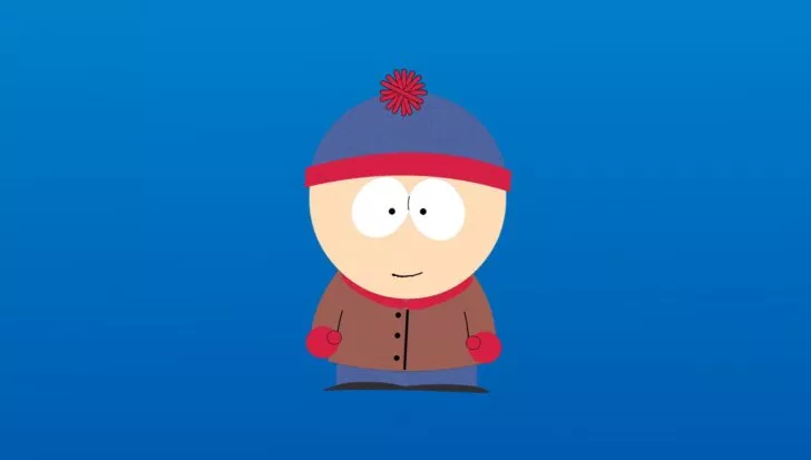 Stan Marsh from South Park wearing his iconic blue and red beanie, brown jacket, red mittens, and blue pants against a blue background.