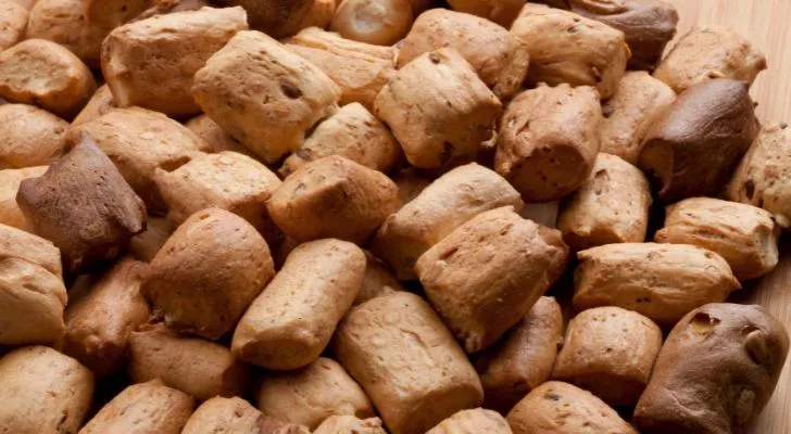 A large collection of small chunks of hardtack piled together