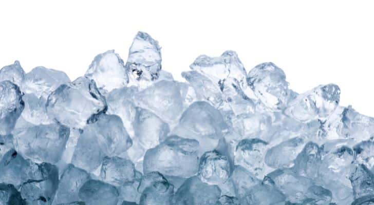 A pile of translucent ice which graduates from dark to light blue