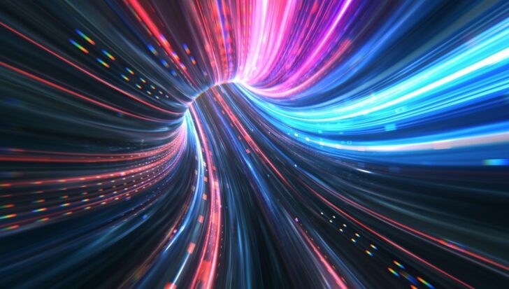 Visual representation of warp speed with colorful light trails in motion