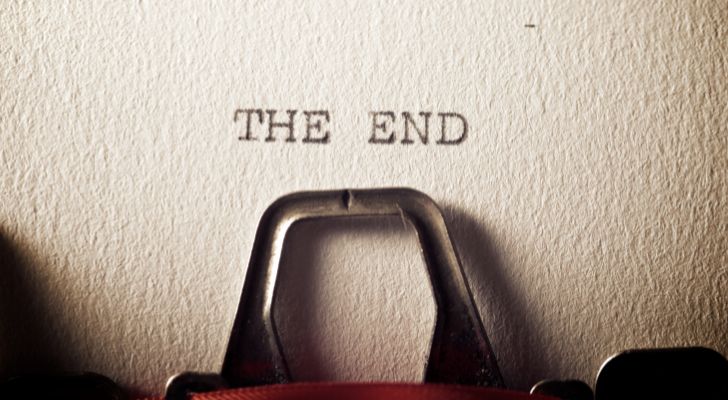 A typewriter having just typed "THE END" on a piece of paper