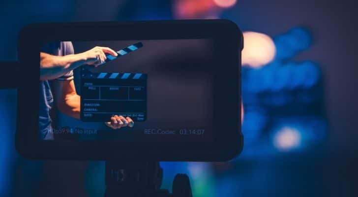 A clapperboard being seen through digital camera