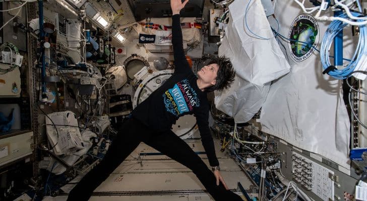 Samantha Cristoforetti performing yoga while in space